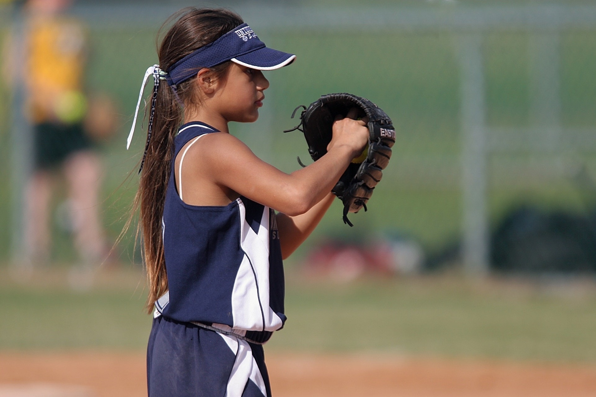 girls playing baseball        
        <figure class=